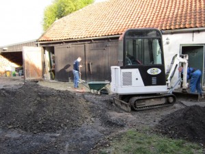 Het erf bestraten